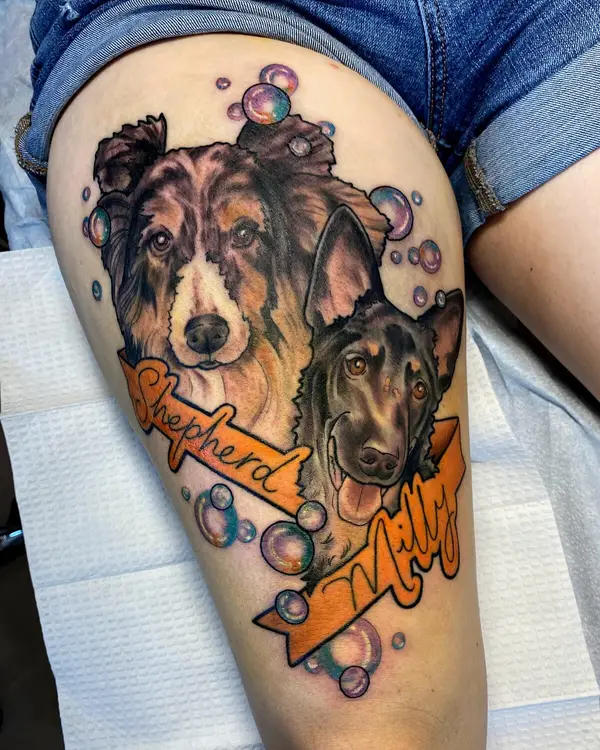 A color tattoo of two dogs with a banner reading Sheperd and Milly