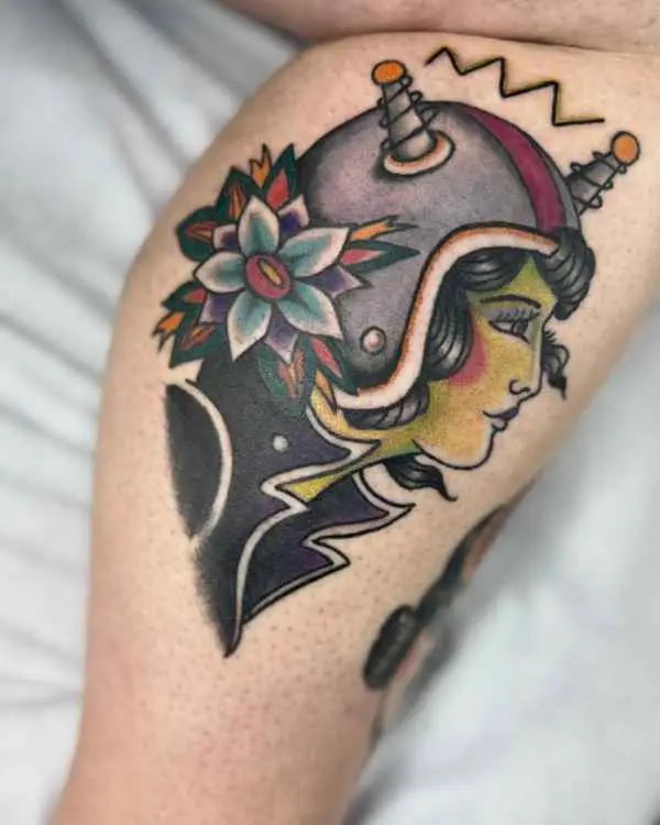 A traditional color tattoo of a woman in a purple space helmet with antennas and a flower at her ear, by Shannon Moxie